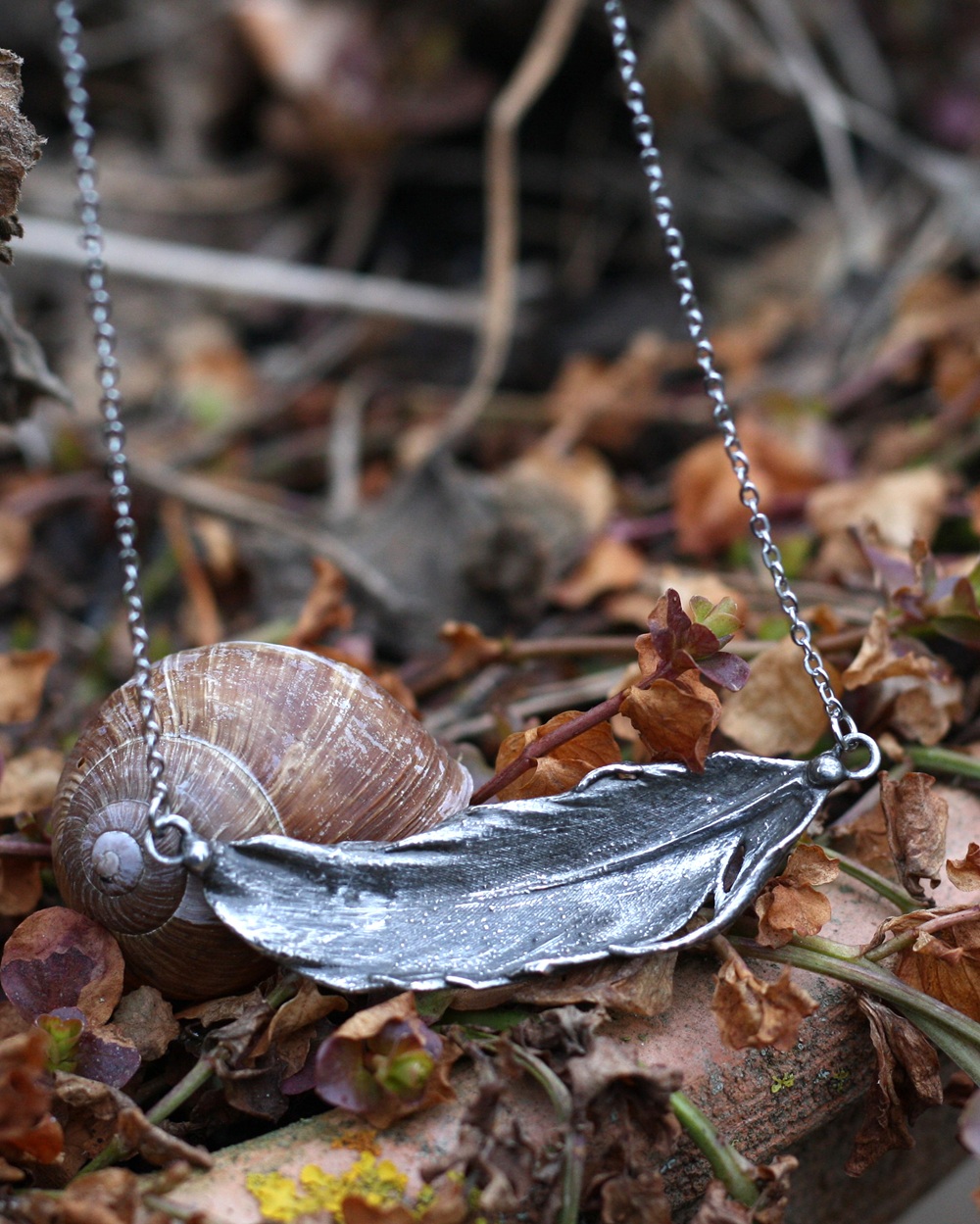 Náhrdelník zavěšené pírko